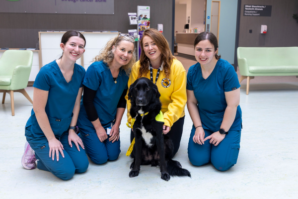 Radiation Therapists Aisling McGlinchey, Tina Gilmartin and Antonia Smyth pictured with Áine Ní Fhlaithearta and Irish Therapy Dog Khai at the Radiation Oncology Centre, University Hospital Galway