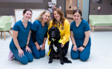 Radiation Therapists Aisling McGlinchey, Tina Gilmartin and Antonia Smyth pictured with Áine Ní Fhlaithearta and Irish Therapy Dog Khai at the Radiation Oncology Centre, University Hospital Galway
